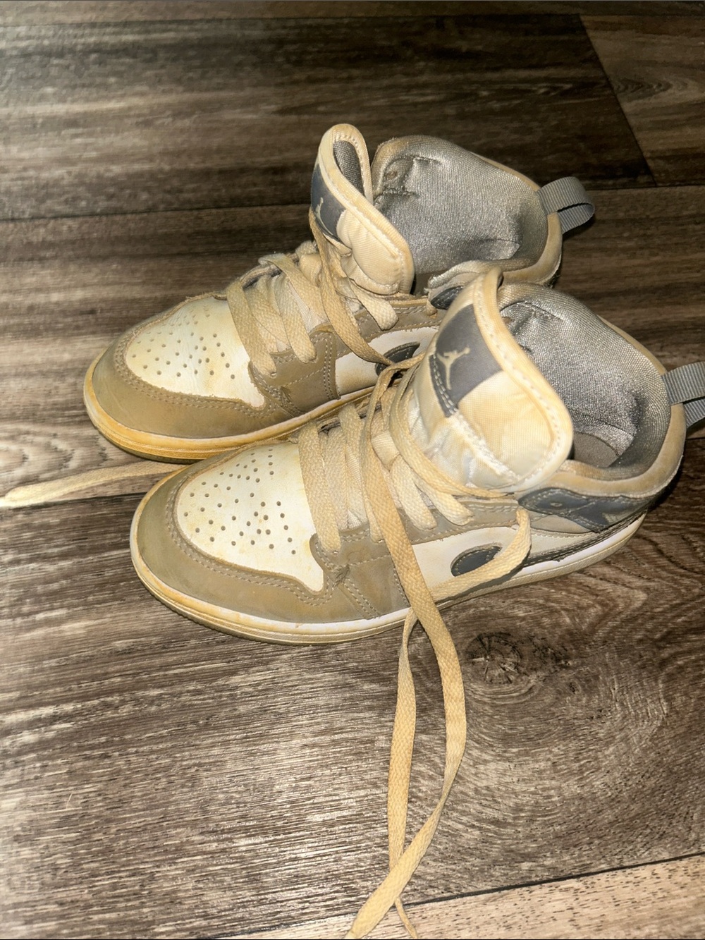 Will clean up well. Excellent .Jordan Kids Mid-Top Sneakers in Beige and Gray